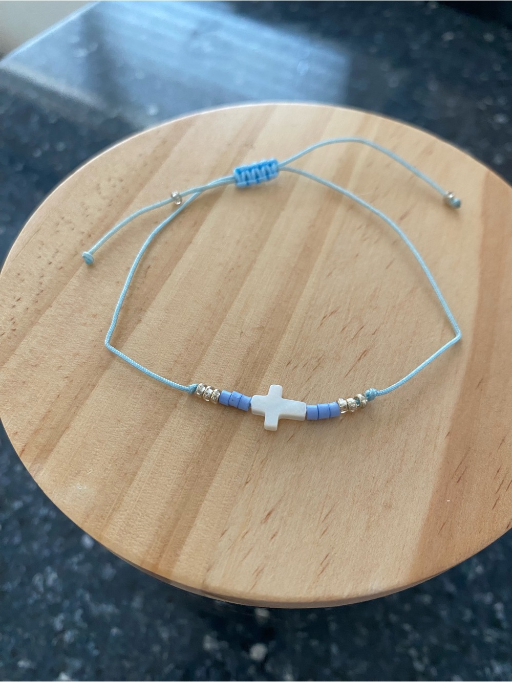 Blue Cord Bracelet with White Cross Bead